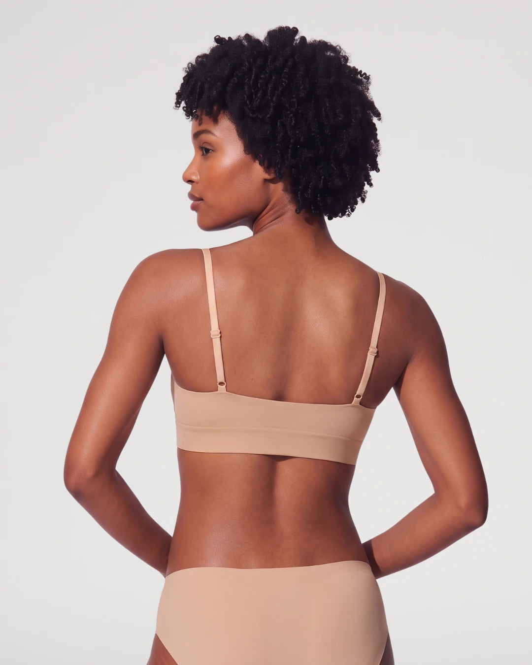 PLERIVA Unlined Scoop Neck Wireless Bralette in Nude, back view