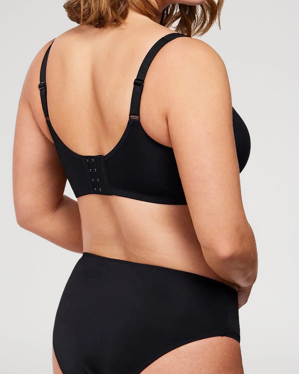PLERIVA Unlined Underwire Full Coverage Minimizer Bra in Black, back view showing the hook closure