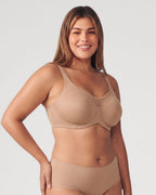 PLERIVA Unlined Underwire Full Coverage Minimizer Bra in Coffee, front view with hand on hip