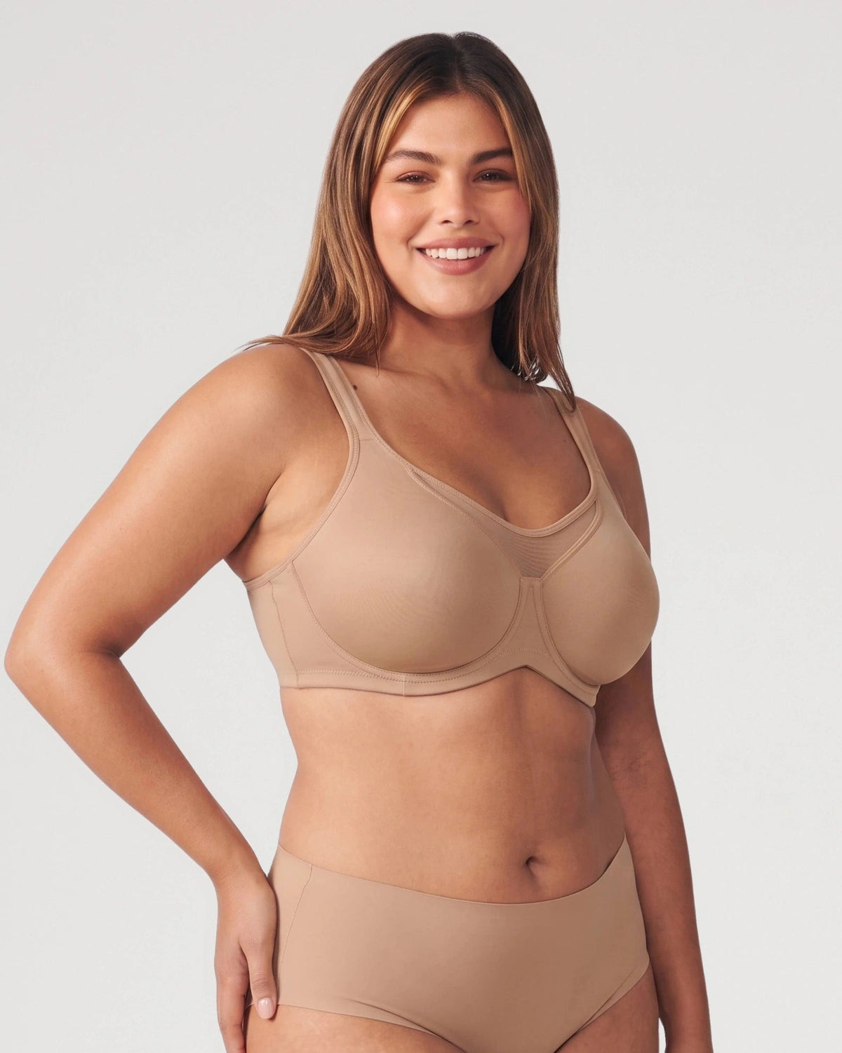 PLERIVA Unlined Underwire Full Coverage Minimizer Bra in Coffee, front view with hand on hip