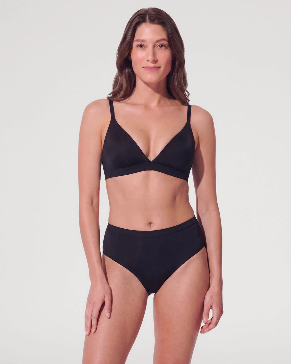 PLERIVA Unlined Wireless Plunge Bralette in Black, full-length front view with matching brief