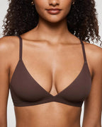 PLERIVA Unlined Wireless Plunge Bralette in Hazelnut, close-up of the plunge neckline