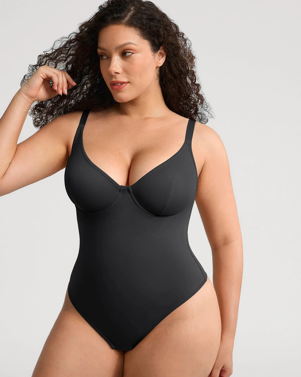 PLERIVA V-Neck Tummy Control Sculpting Bodysuit in Black, front view on model