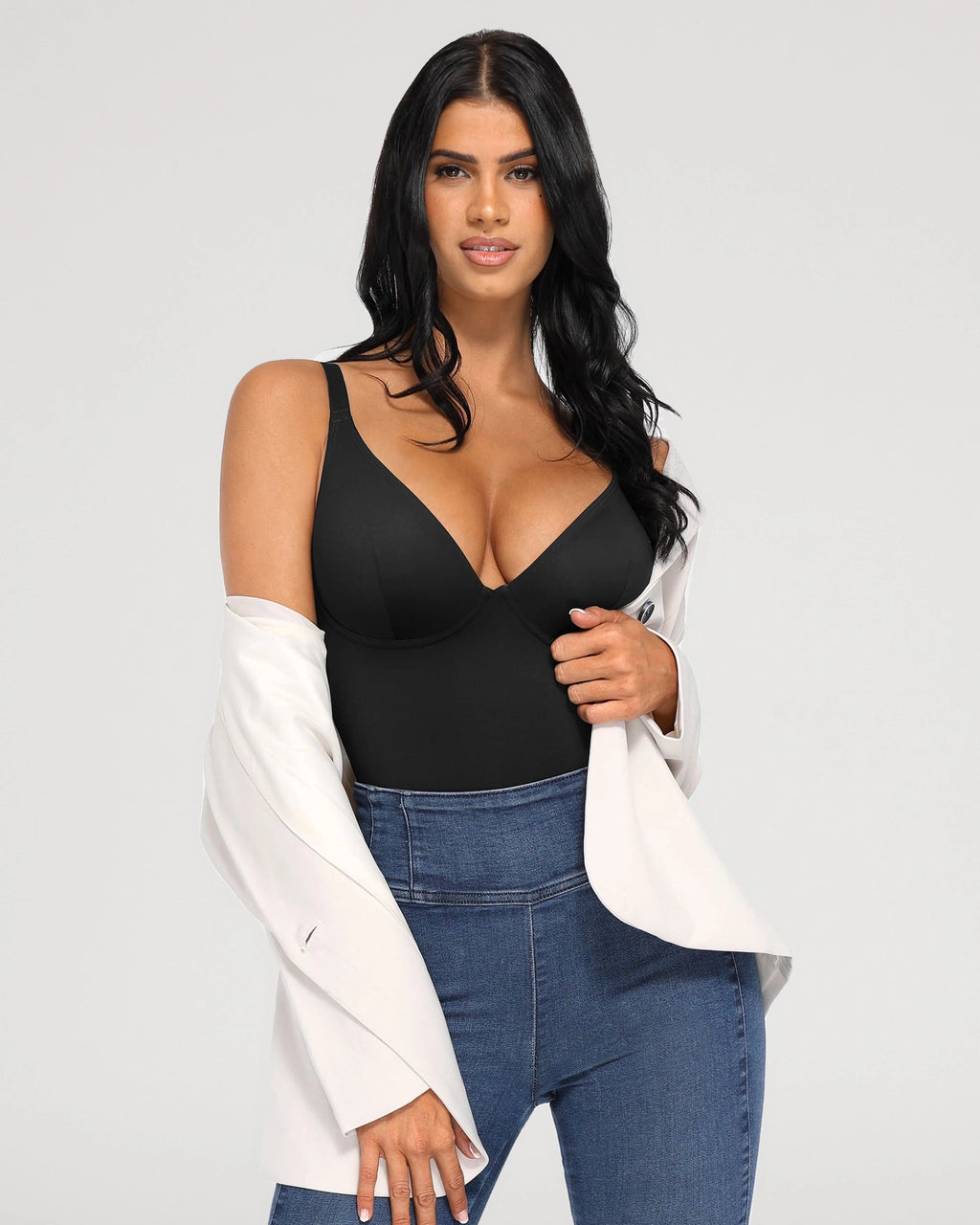 PLERIVA V-Neck Tummy Control Sculpting Bodysuit in Black, styled with jeans and a blazer