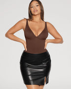 PLERIVA V-Neck Tummy Control Sculpting Bodysuit in Brown, styled with a leather skirt