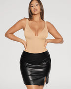 PLERIVA V-Neck Tummy Control Sculpting Bodysuit in Coconut White, styled with a leather skirt