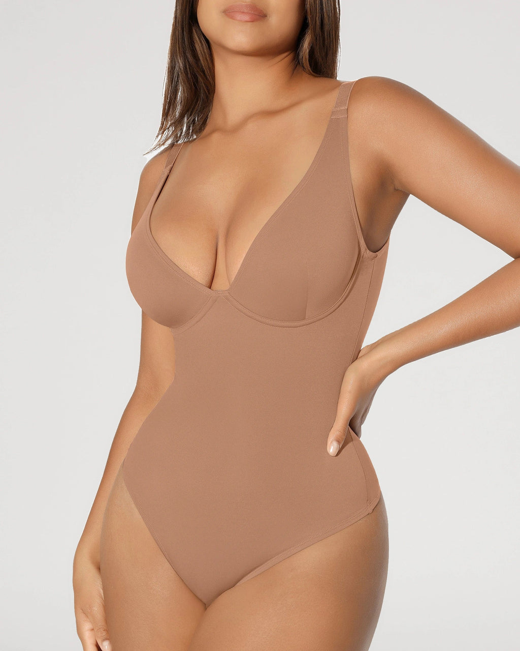 PLERIVA V-Neck Tummy Control Sculpting Bodysuit, front close-up on model in a tan shade
