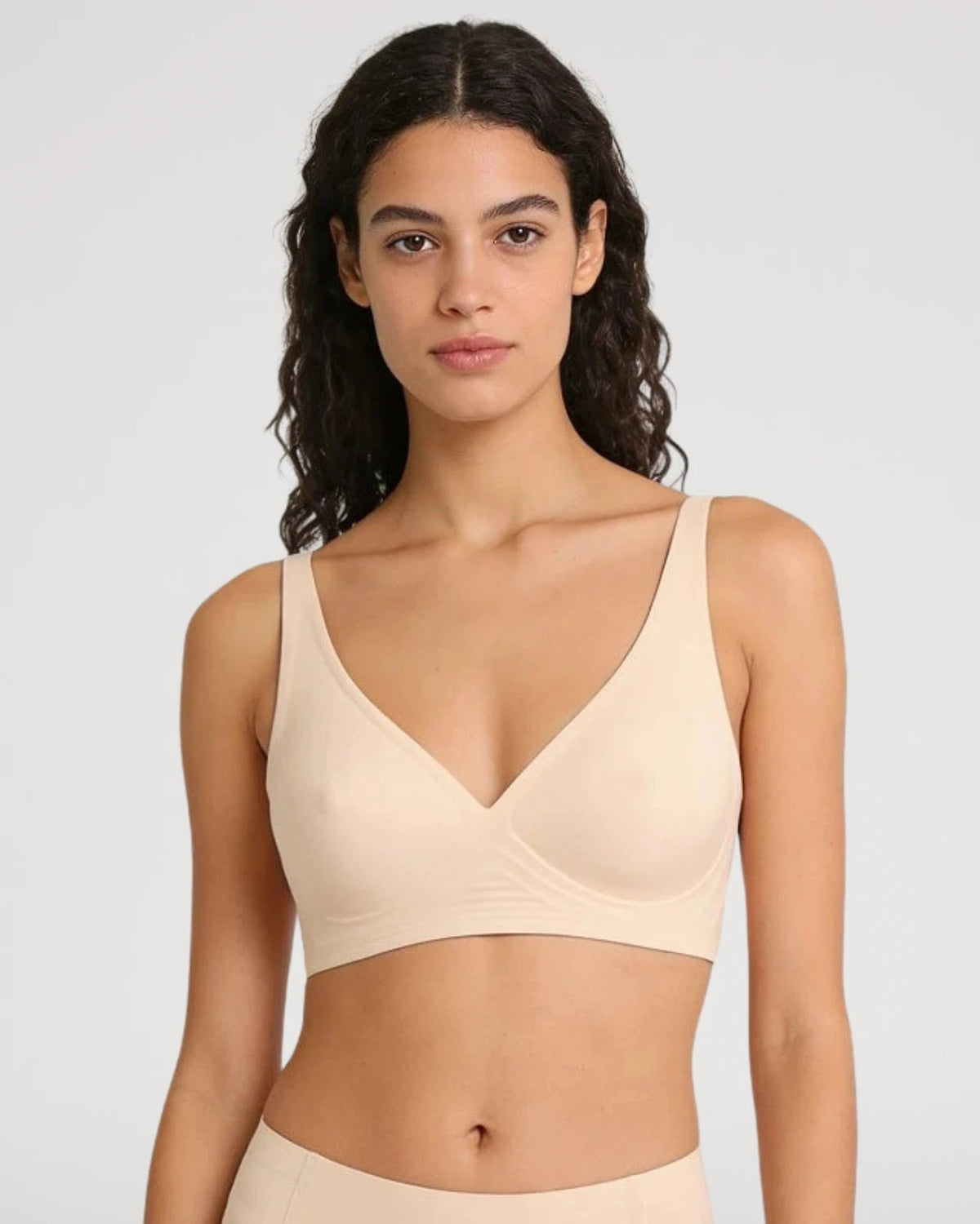 PLERIVA Wireless Contour Detail Lift Bra in Nude, relaxed front view