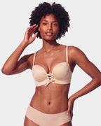 PLERIVA Wireless Lift Bra with Lace-Up Front in Nude, front view on model showing the lace-up front