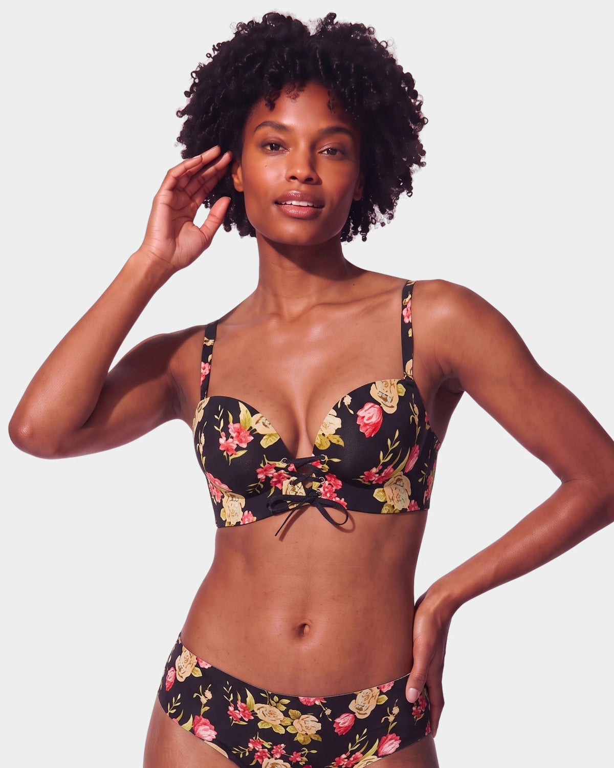 PLERIVA Wireless Lift Bra with Lace-Up Front in Vintage Black Floral, front view on model showing the lace-up front