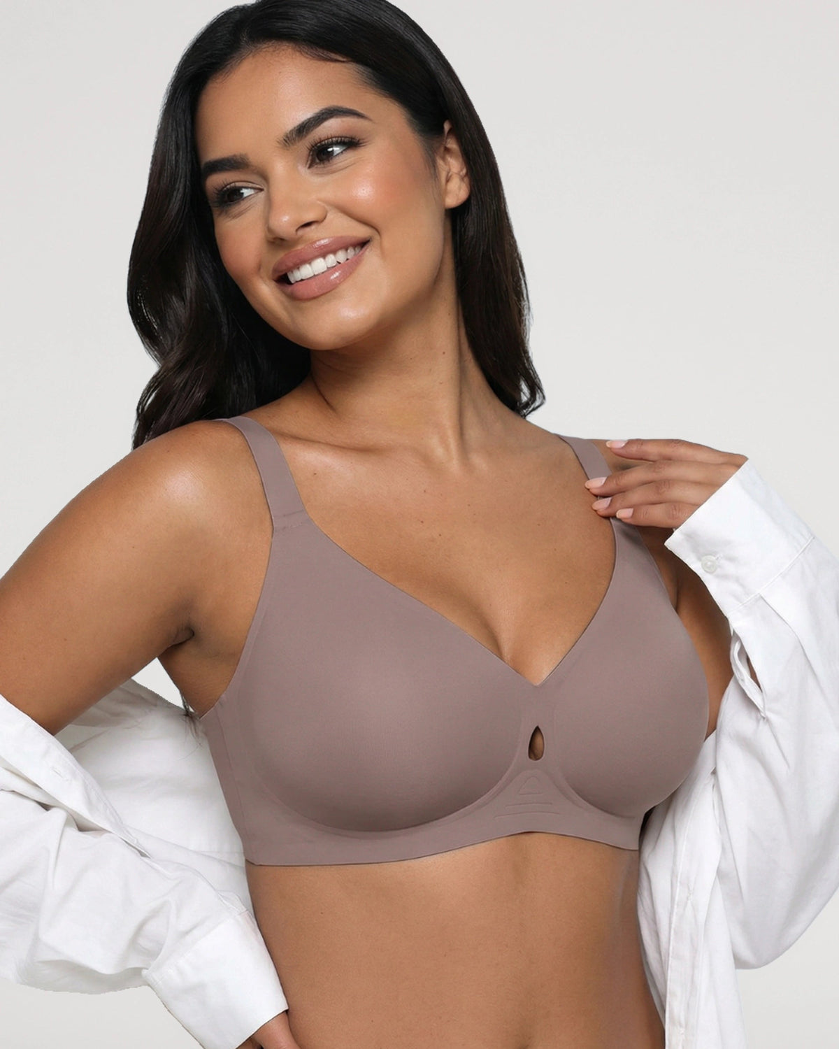 PLERIVA Wireless Plunge Lift Bra in Gray, front view on model with an open shirt