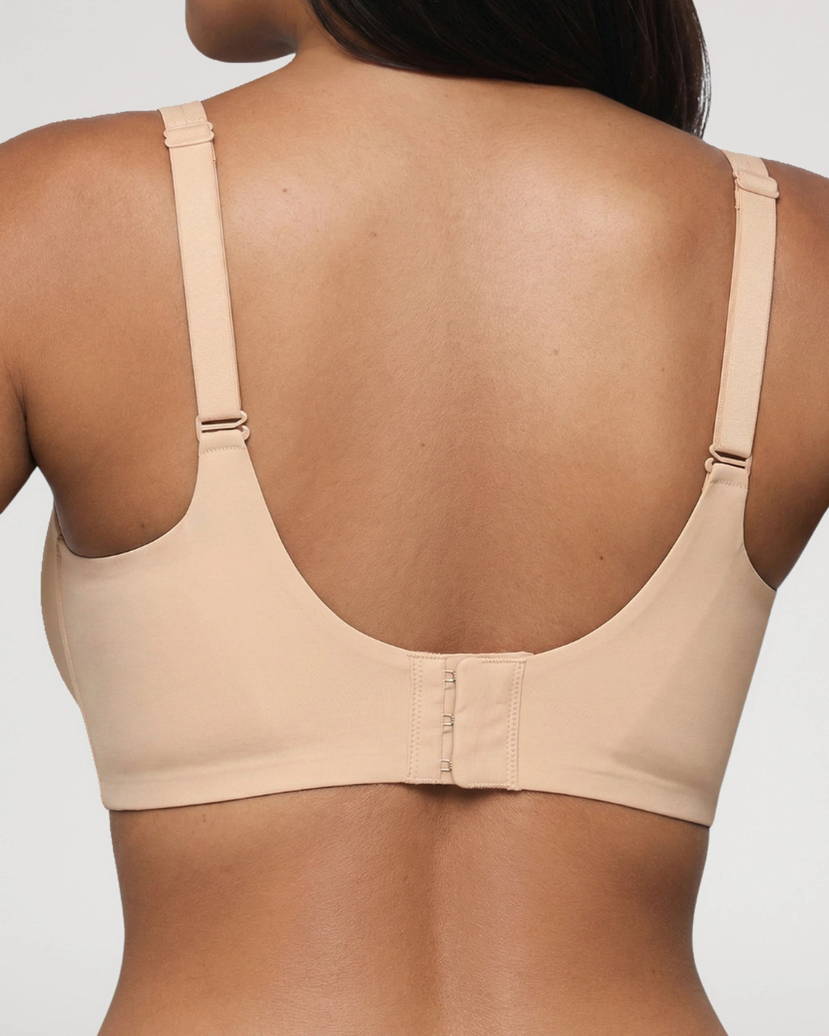 PLERIVA Wireless Plunge Lift Bra in Nude, back view showing the hook-and-eye closure