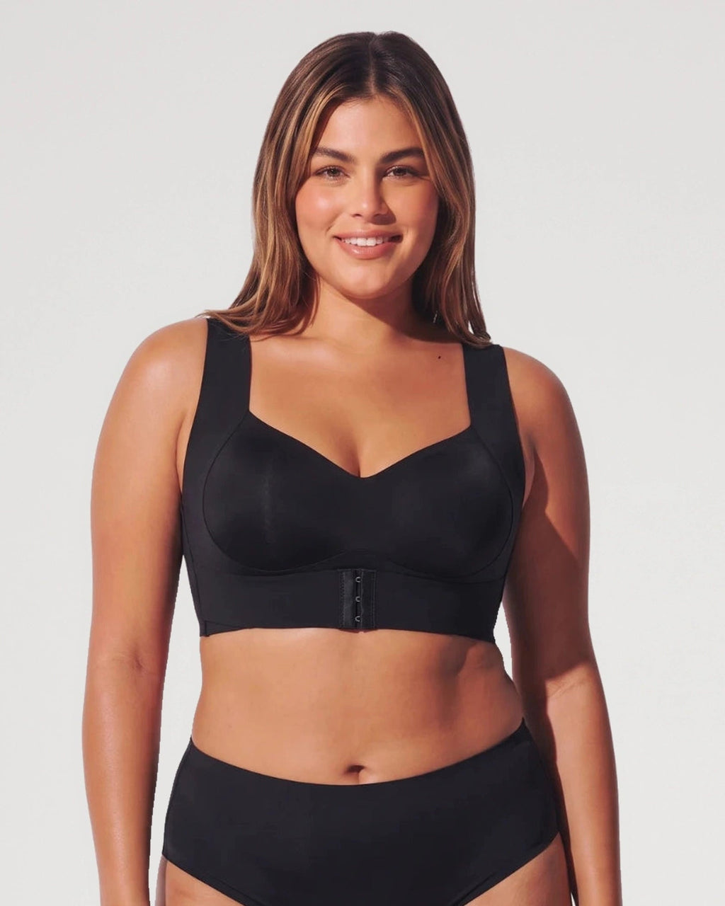 PLERIVA Wireless Posture Bra with Front Closure in Black, front view on model