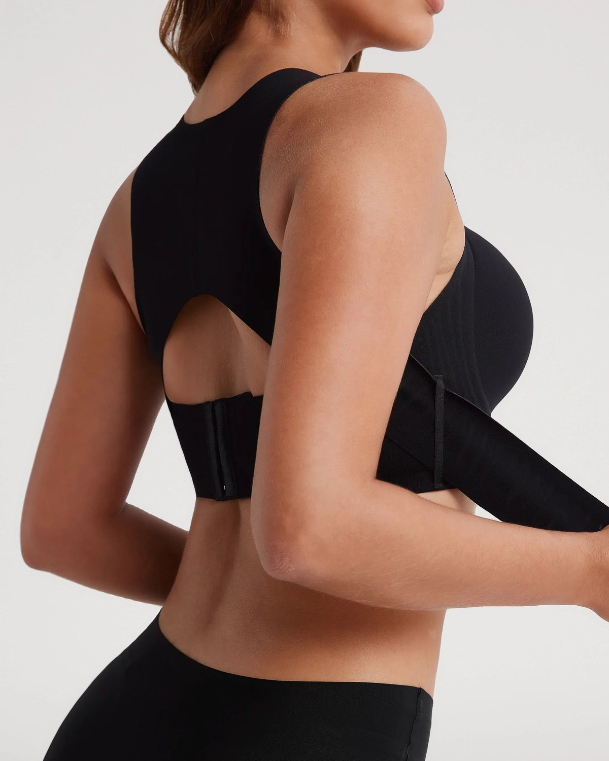 PLERIVA Wireless Posture Bra with Front Closure in Black, back view showing the open back panel
