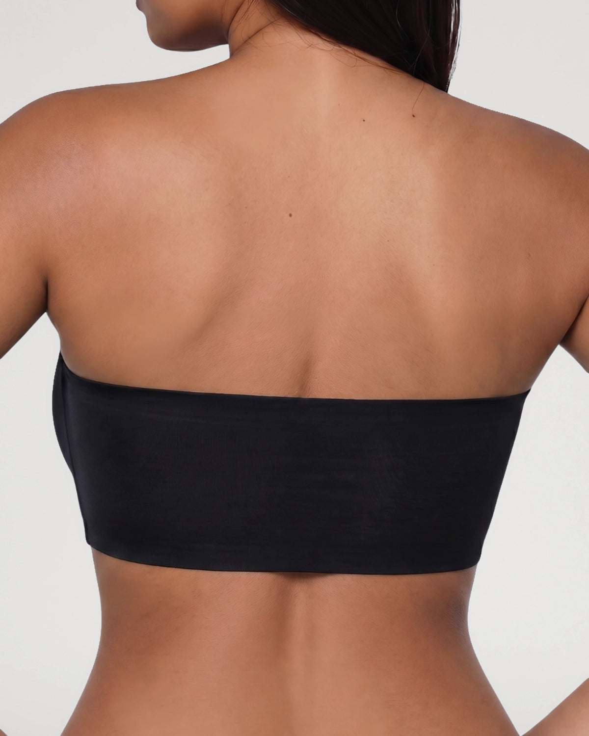 PLERIVA Wireless Seamless Strapless Bandeau in Black, back view on model