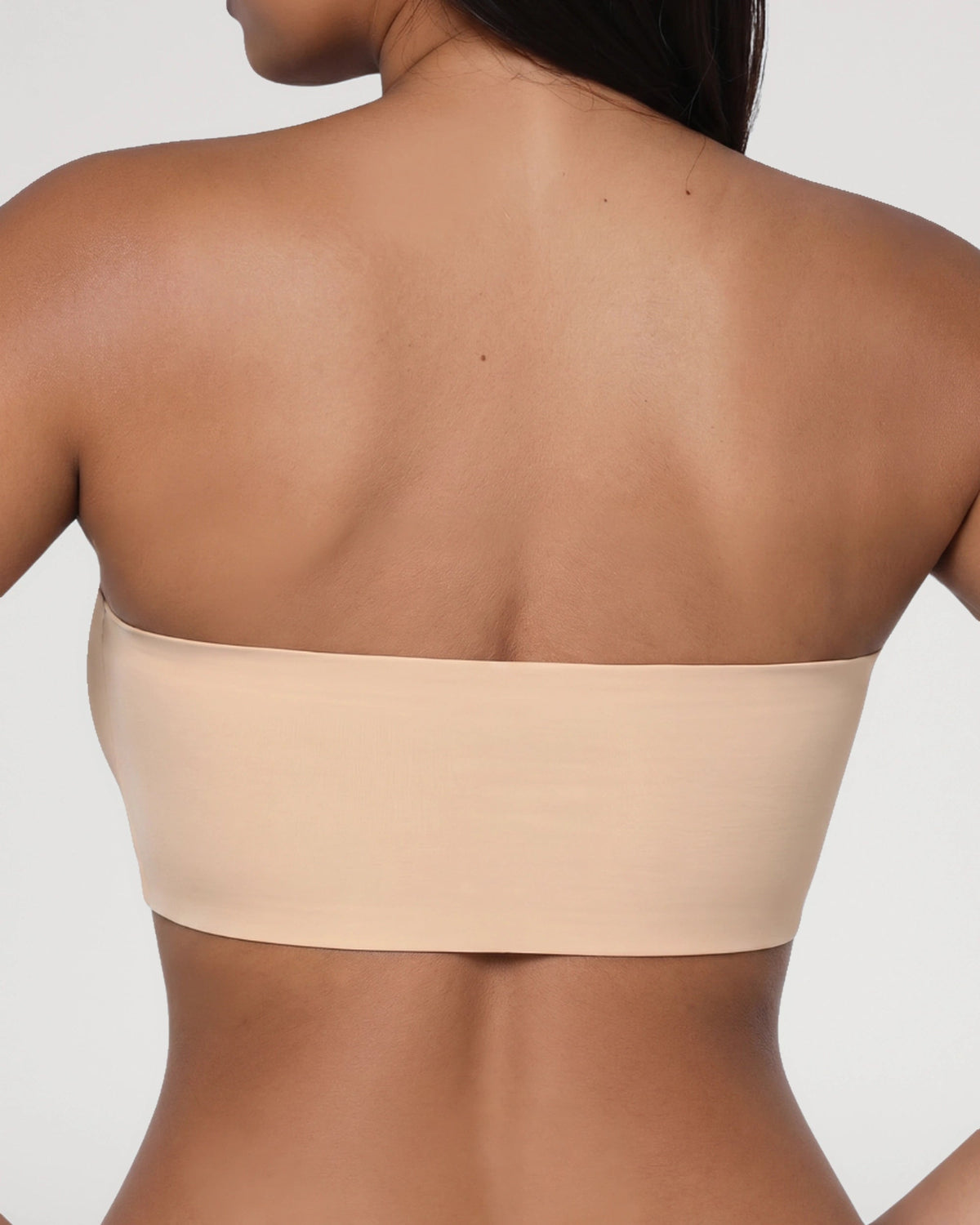 PLERIVA Wireless Seamless Strapless Bandeau in Nude, back view on model