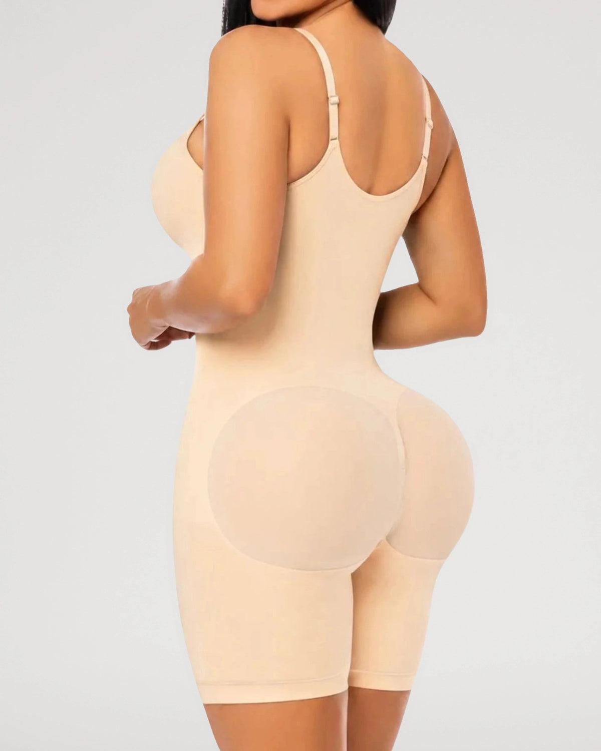 PLERIVA Zip Front Mid Thigh Shaping Bodysuit in Nude, back view on model