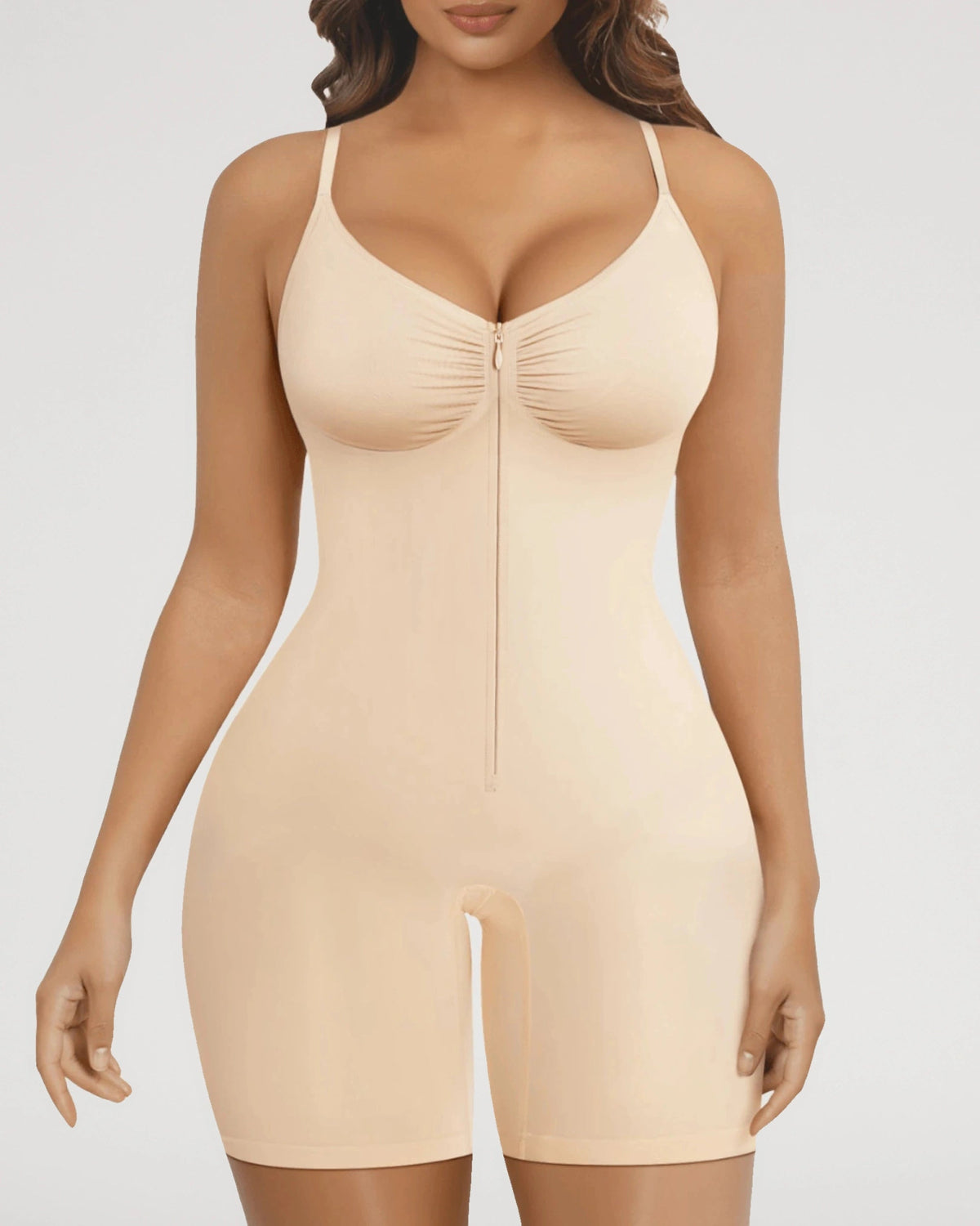 PLERIVA Zip Front Mid Thigh Shaping Bodysuit in Nude, front view on model